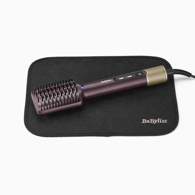 Brosse de coiffage BaByliss pour un lissage rapide sur cheveux humides ou secs avec finition brillante.