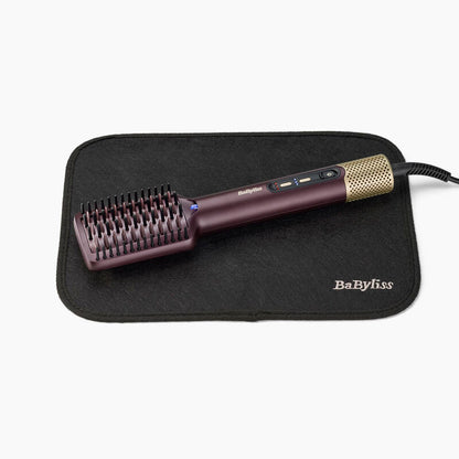 Brosse de coiffage BaByliss pour un lissage rapide sur cheveux humides ou secs avec finition brillante.