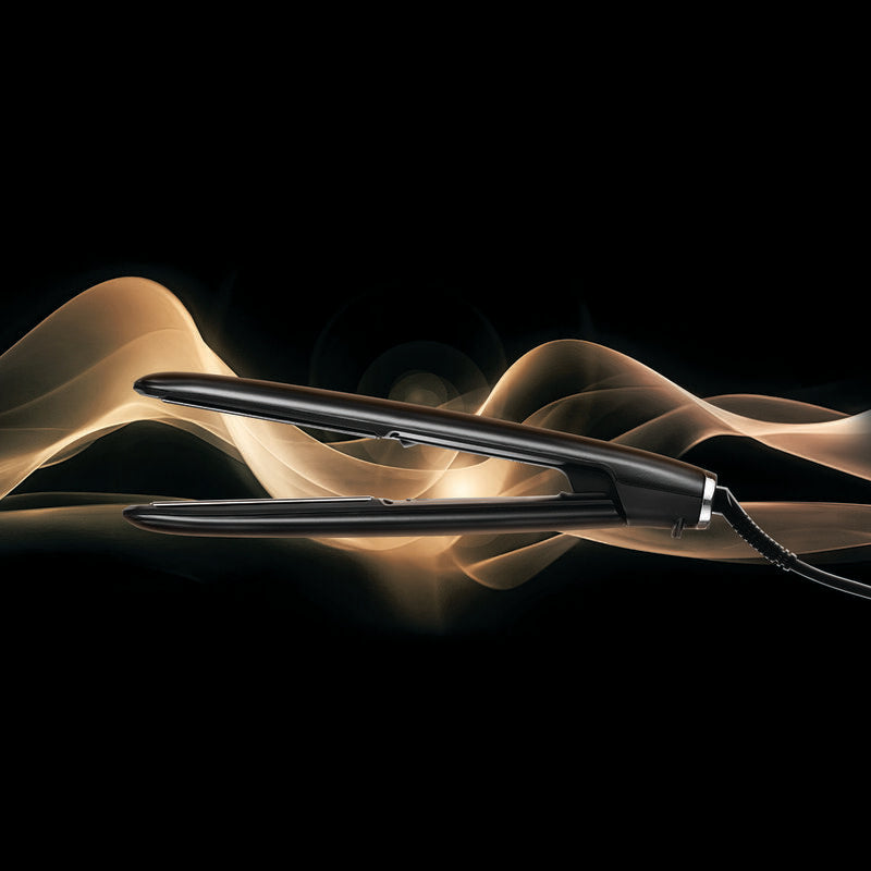 Styler BaBylissPRO STILISTA argent utilisé pour lisser les cheveux avec brillance