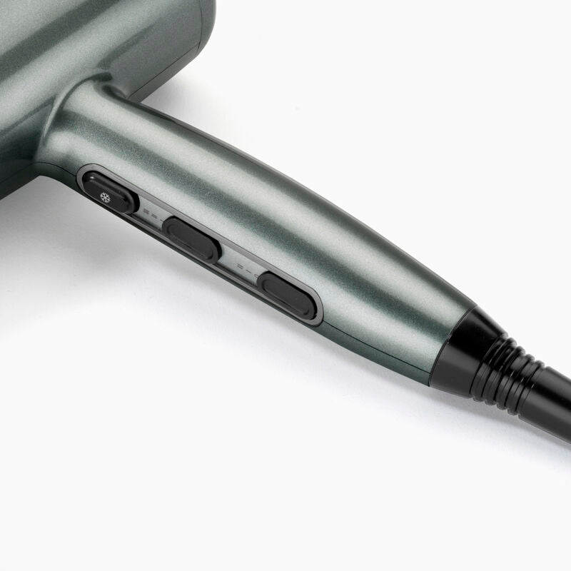 Sèche-cheveux avec touche air frais pour fixation de coiffure